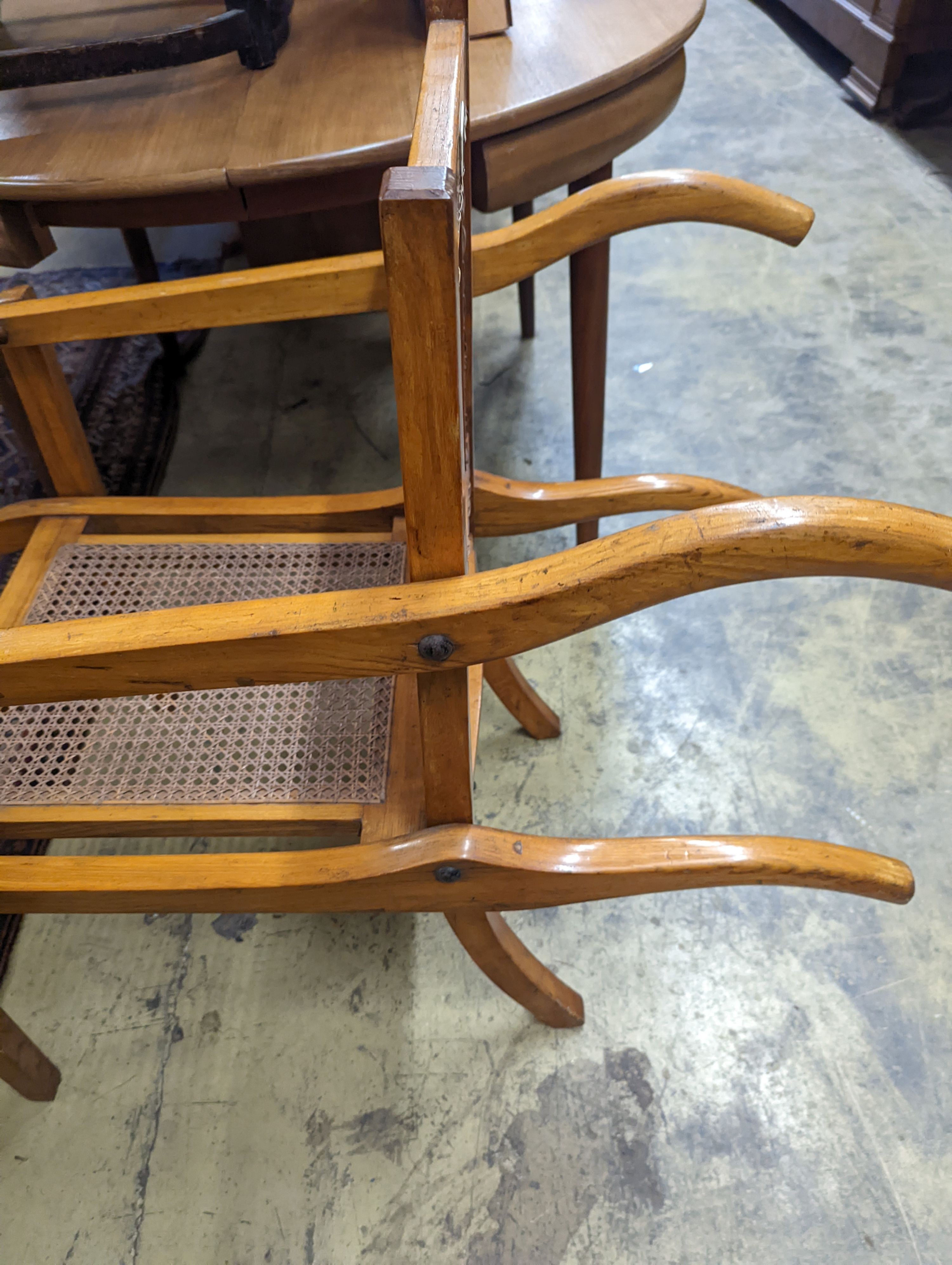 A late Victorian Leveson & Sons caned oak folding invalid's chair